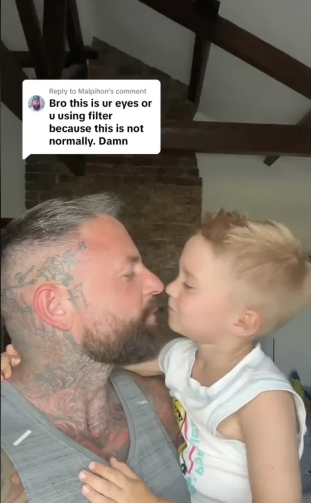 A dad has received backlash for kissing his son on the lips.