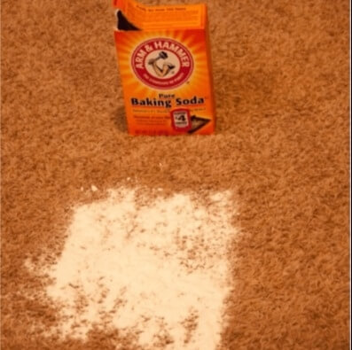 Remove Oil Stains Out Of The Carpet With Baking Soda