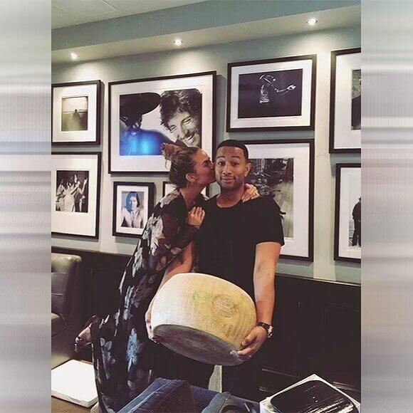 John Legend Buys Chrissy Teigen a Massive Wheel of Cheese