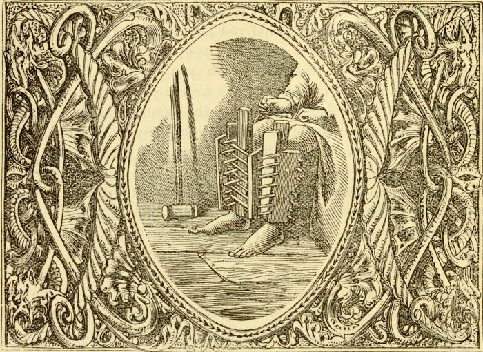 Medieval t*****e device with spiked leg iron and hammer surrounded by intricate ornate frame details.